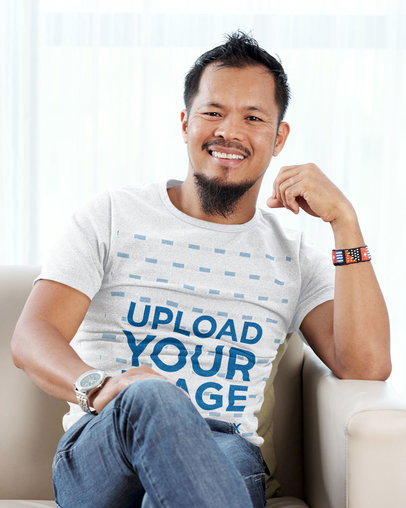 T-Shirt Mockup Featuring a Bearded Man Sitting on a Sofa 39467-r-el2