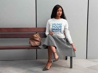 Placeit Woman Wearing a Crew Neck Sweatshirt Template While Looking