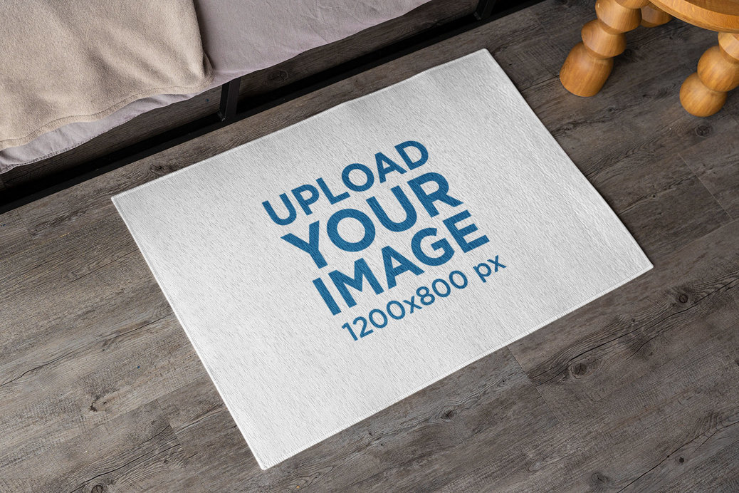 Placeit - Mockup of an Area Rug Placed by a Bed
