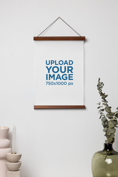 Mockup of a Poster Hanging on a Wall Featuring a Plant