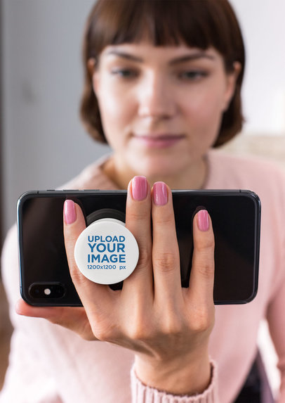 Phone Grip Mockup of a Woman Holding Her Cellphone in Landscape Mode 28156
