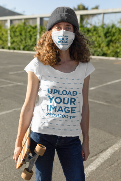T-Shirt Mockup of a Woman With a Face Mask Holding a Skateboard