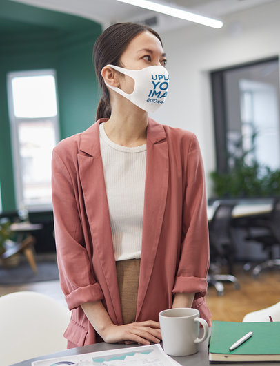 Mockup of a Woman Wearing a Face Mask at the Office M3715-r-el2
